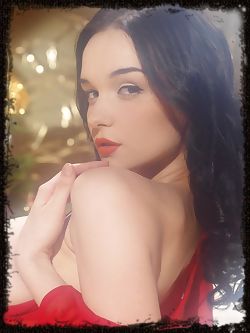 With her long black elegant hair, Jenya portrays a goddess which delivers a bountiful harvest as she displays her natural, stunning beauty in alluring, tempting poses beside the christmas tress.
